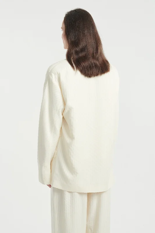 Ivory textured belted fluid jacket